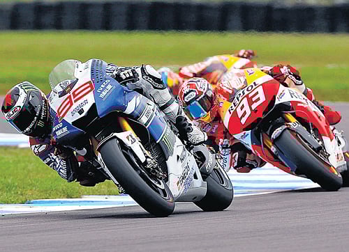 fine race Yamaha's Jorge Lorenzo of Spain (left) takes a corner ahead of compatriot Marc Marquez on Sunday. reuters