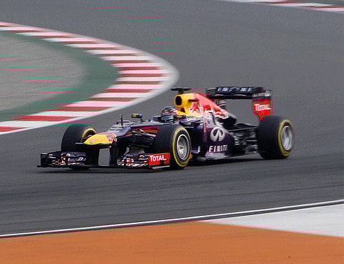 Greater Noida: Formula One driver Red Bull's Sabastian Vettel during the qualifying session of 2013 FIA Formula One World Championship Indian Grand Prix at Buddh International Circuit (BIC) in Greater Noida on Saturday. PTI Photo by Manvender Vashist