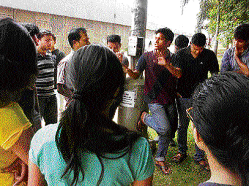 Involved: The tenants holding a discussion.
