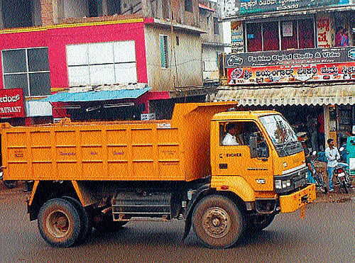 One of the trucks transporting sand without any fear in Mudigere taluk on Sunday. dh photos