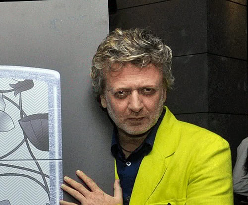 Fashion designer Rohit Bal today unveiled the limited edition of his new collection of an iconic windproof lighter that blends ''America's sophistication with India's intricate design''. PTI Image.