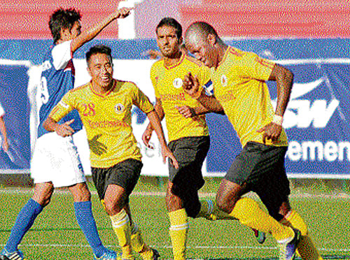 jubilant: East Bengal's Edeh Chidi (right) celebrates after scoring against Bengaluru FC in their I-League match on Sunday. dh photo/ kishor kumar bolar