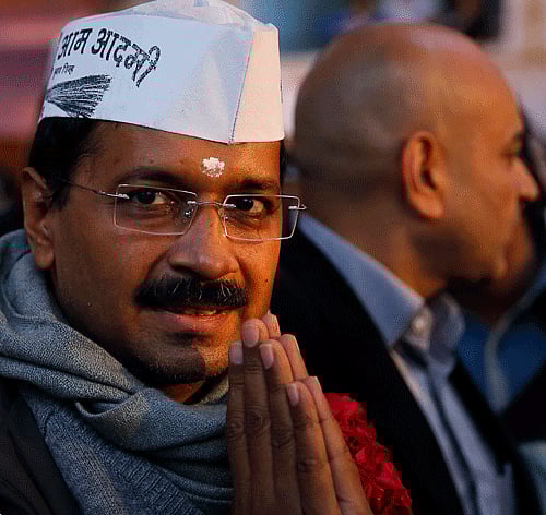History was made Saturday when Arvind Kejriwal, 45, took oath as Delhi's seventh chief minister at a public ceremony at the Ramlila Maidan watched by tens of thousands of excited supporters and on live television by people around the country. PTI Photo.