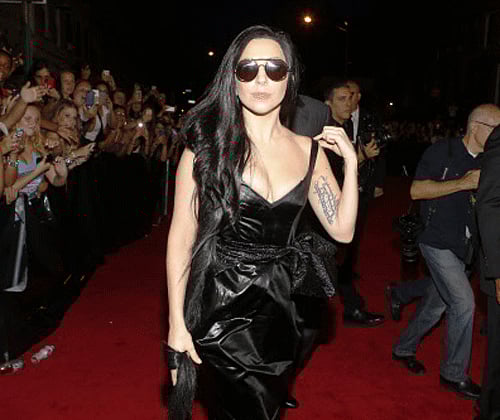 Pop icon Lady Gaga has urged women worldwide to stop cribbing about their figures because people who achieve great do not have to look like supermodels. Reuters File Photo.