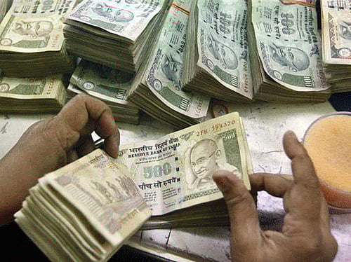 Amid volatile equity market, Indian companies mopped-up Rs 1,619 crore in 2013 through initial public offerings, the lowest level in 12 years. PTI  file photo