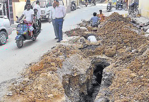 A dug-up road near the Old Cemetery Road in Shivajinagar. DH PHOTOS by bh shivakumar