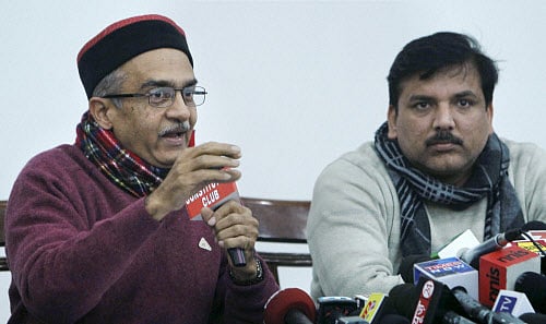 AAP leaders Prashant Bhushan and Sanjay Singh addressing a press conference in New Delhi on Saturday. PTI Photo by Vijay Verma