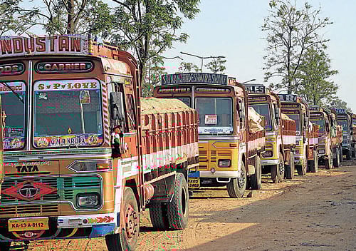 Commuters and supply of perishable goods like vegetables and meat may be affected badly from Sunday as commercial goods vehicles, tourist vehicles and taxis will stay off the road across the State for an indefinite period from Saturday night in support of sand transporters. DH File Photo