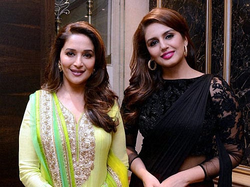 Bollywood actresses Madhuri Dixit and Huma Qureshi at an permotional event in New Delhi. PTI Image