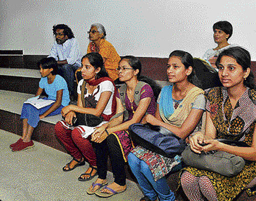 Glued: A section of the audience.