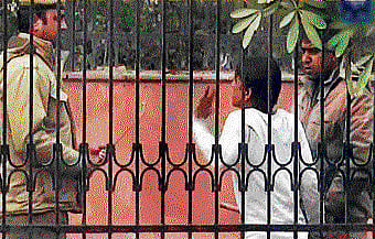 A video shot by AAP shows policemen brutally beating up a youth in New Delhi. PTI / TV GRAB