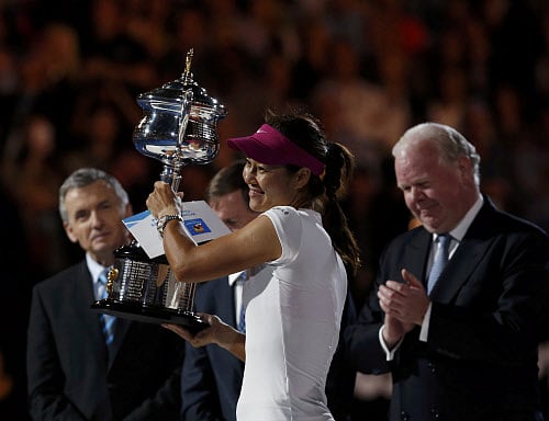 China's Li Na sports a huge smile after capturing the Australian Open on Saturday. Li Na beat Dominika Cibulkova 7-6, 6-0. Reuters Photo