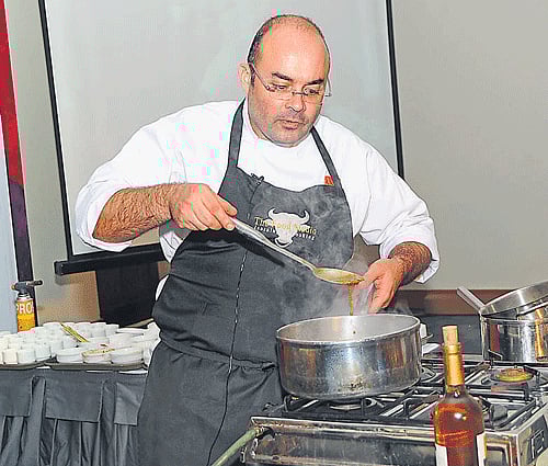 interested Paul cooking with coffee at the workshop.