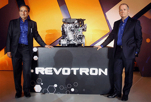 Ranjit Yadav, President, Passenger Vehicle Business Unit, Tata Motors Ltd. and Tim Leverton, President and Head-Advanced & Product Engineering, Tata Motors Ltd. during the launch of 'Revotron' petrol engine in Mumbai on Monday. PTI Photo