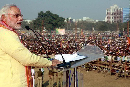 An unprecedented gathering and a trademark rousing speech marked BJP leader Narendra Modi's debut at Brigade Parade Ground in central Kolkata on Wednesday.  PTI