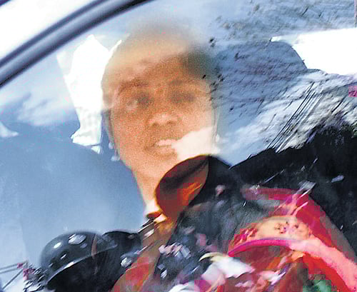 Prema Kumari arrives in a car at the hospital where Ramdas was admitted, in Mysore on Friday. DH Photo