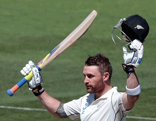 New Zealand's Brendon McCullum acknowledges his 200 against India during the second innings on day four of the second international test cricket match at the Basin Reserve in Wellington, February 17, 2014. REUTERS