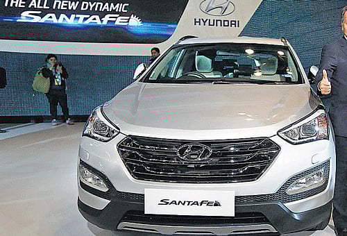 Budget impact: Carmakers announce price cuts