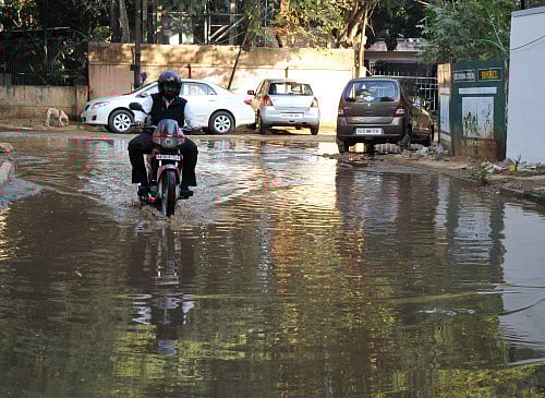 Water overflowing from a pipe near HAL Corporate Office in Bangalore. DH File Photo