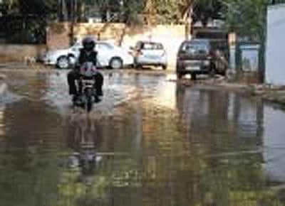 Water overflowing from a pipe near HAL corporate office in Bangalore DH File photo
