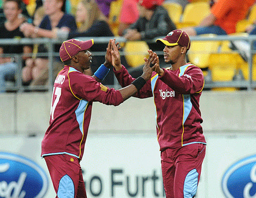 AP File Photo of Lendl Simons and Dwayne Bravo. Ireland's flirtation with cricketing history came to a disappointing end in Kingston's Sabina Park when they lost their second Twenty20 international with the West Indies.
