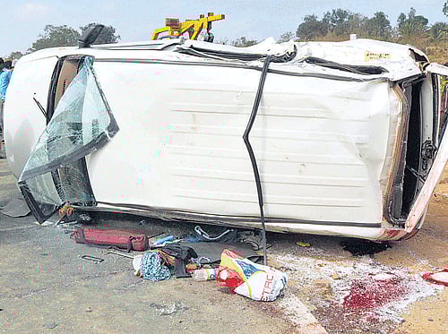 tragedy The SUV which was hit by a lorry at Mugad village near Dharwad on Saturday, killing one of the Russian tourists travelling in it. DH PHOTO
