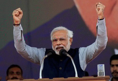 BJP Prime Ministerial candidate Narendra Modi addresses the public during an election campaign rally in Lucknow on Sunday. PTI Photo