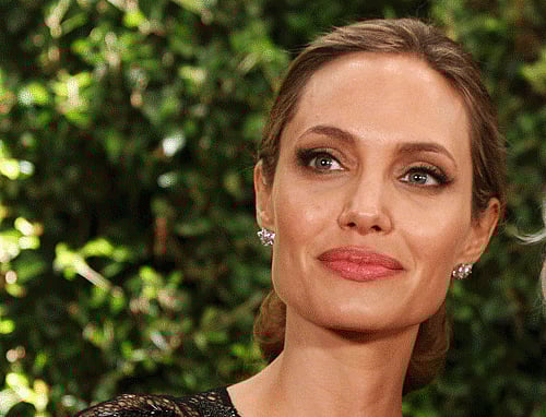 Actress Angelina Jolie, who had a double mastectomy in May last year, says 'there's still another surgery to have, which I haven't yet'. Reuters File Photo
