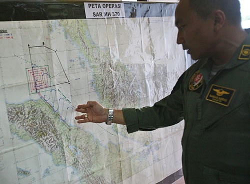 Malaysian authorities are probing new information that the missing plane with 239 people on board dropped to an altitude of 5,000 feet or possibly lower to evade radar detection after it turned back midair. AP File Photo