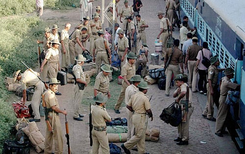 Security jawans arrive for the Lok Sabha election in Varanasi on Friday. PTI Photo