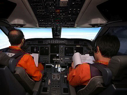 The last words from the cockpit of the missing Malaysian jet MH370 were a standard Good night Malaysian three seven zero, said Malaysian authorities, changing their account of the critical last communication from a more casual All right, good night. Reuters photo