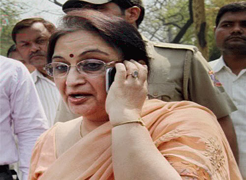 Nitish Katara's mother Neelam Katara comes out of High Court after vardict on Wednesday. High Court upheld the conviction of three convicts by the trial court in the 12-year-old Nitish Katara murder case. PTI Photo