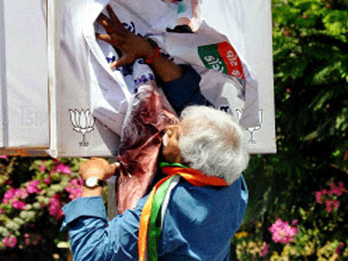 The poster war between Congress Vadodara candidate Madhusudan Mistry and the BJP refuses to die down as the saffron party has now demanded that the expenses of the exhibits carrying photos of Rahul Gandhi with him should be included in his personal expenditure. PTI File Photo