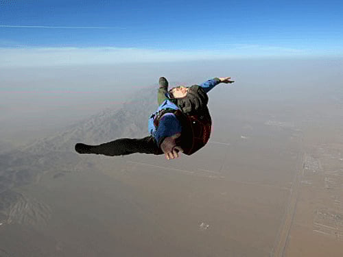 During his three-and-a-half-minute descent, Ernesto Gainza used a parachute measuring only 35 square feet, creating a new Guinness record. AP photo for representation purpose only.