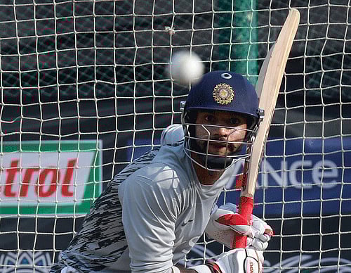 India's swashbuckling opening batsman Shikhar Dhawan has been named as one of the Five Cricketers of the Year, an honour dating back to 1889, by Wisden for his performance in 2013. AP File Photo.