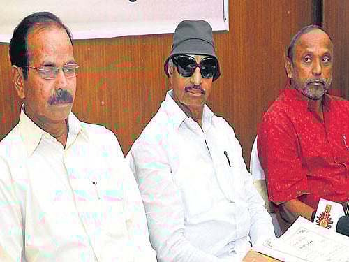 Former president of District Kannada Sahitya Parishat Maddikere M Gopal, former MLA Vatal Nagaraj and writer Kalegowda Nagavara during the seminar on election, in Mysore on Saturday. DH Photo