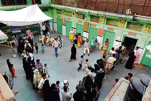 Fulfilling their national duty, many migrants travelled back to their home states to vote. PTI Photo