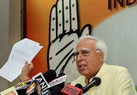 After releasing a three-year-old CD of Uma Bharti attacking Narendra Modi, Congress today latched on to another video clip featuring yoga guru Ramdev to raise embarrassing questions on the BJP Prime Ministerial candidate's campaign against black money. PTI photo