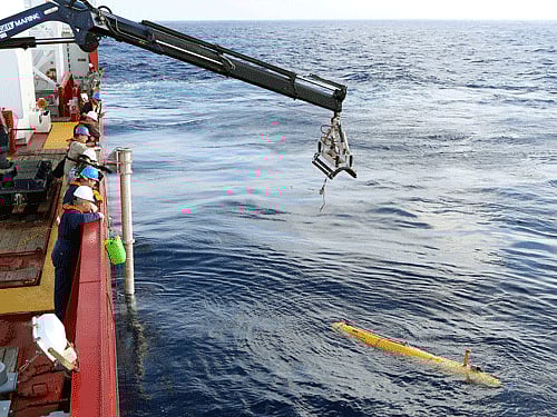 A robotic mini-submarine deployed to unprecedented depths of the Indian Ocean to hunt for the crashed Malaysian jet has searched nearly two-thirds of the focused area with no sign of any wreckage, as a tropical cyclone today threatened to hamper operations. AP photo