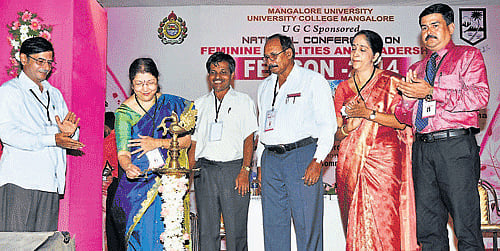Women's University (Bijapur) Vice Chancellor Prof Meena Chandawarkar inaugurates the UGC sponsored two-day national conference 'FEMCON-2014' on 'Feminine qualities and leadership,' organised by the Department of Post Graduate Studies in Commerce at University College, Mangalore and the Department of Studies and Research in Commerce at Mangalagangothri, at University College in Mangalore on Tuesday. Mangalore University Vice Chancellor (acting) H Nagalingappa, University College Principal Prof Sathyanarayana Mallipattana and Seminar Convener Anasuya Rai among others look on. DH photo