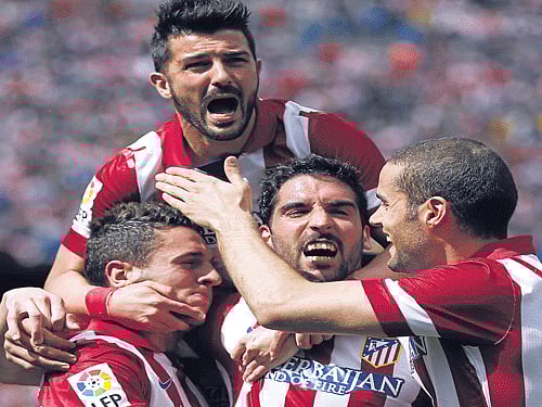 The stalemate at the Vicente Calderon, which Atletico coach Diego Simeone believes gives Chelsea a slight advantage in next week's return at Stamford Bridge, came at a cost for the 2012 winners. Reuters photo