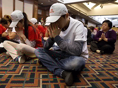 Faced with anger and frustration from distraught families of passengers on the ill-fated Flight MH370, Malaysian Premier Najib Razak said the report will be available to the public. AP file photo