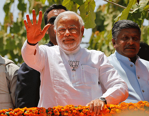 If development and corruption are an issue for voters across the country, in Gujarat the election is being fought on an emotional pitch. PTI photo