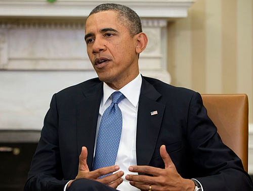 President Barack Obama today said the US was 'absolutely committed' to provide more assets in the 'laborious' hunt for the Malaysian jet in the Indian Ocean where a robotic mini-sub expanded its search area after failing to locate any wreckage despite 14 missions. AP photo