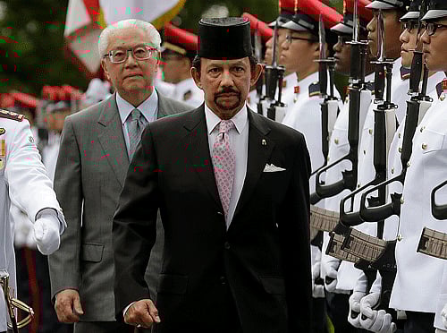 The sultan of oil-rich Brunei announced that tough Islamic criminal punishments would be introduced tomorrow, pushing ahead with plans that have sparked rare domestic criticism of the fabulously wealthy ruler and international condemnation. AP file photo