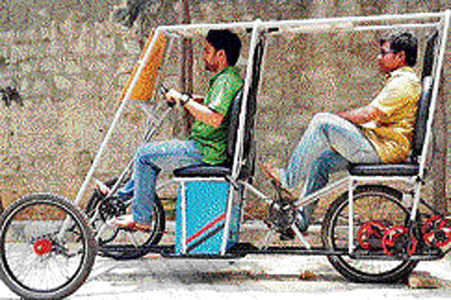 Automobile engineering students at the Dayanand Sagar College of Engineering (DSCE) have designed a tricycle that runs on solar energy. DH photo