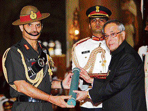 Lt Gen Dalbir Singh Suhag receiving the PVSM from  President Pranab Mukherjee earlier this month.