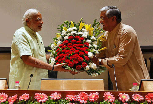 Undeterred by media reports of his successor being announced, the Gujarat chief minister immersed himself in clearing pending files at his office in Sachivalaya. Reuters photo