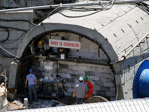 Miners close an entrance to their coal mine in Soma, Turkey. Twenty four people, including company executives, have been detained as Turkish officials investigate the mining disaster that killed 301 people. AP photo
