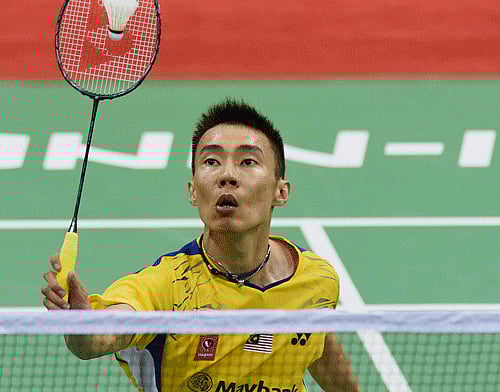 New Delhi: World No 1 Malaysian badminton player Chong Wei Lee in action against K Srikanth of India during the Thomas Cup match in New Delhi on Sunday. PTI Photo by Shirish Shete(